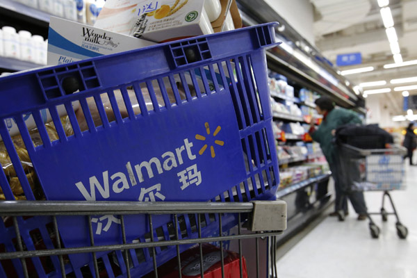 Wal-Mart axes senior jobs, stores