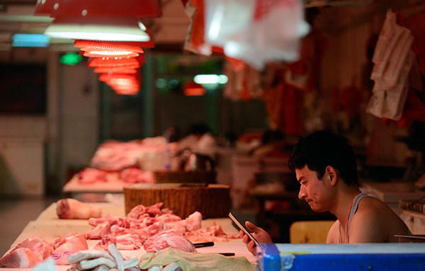 Pork prices propel rise in inflation