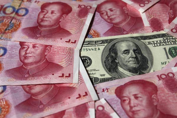 Wider yuan fluctuations unavoidable: Central bank paper
