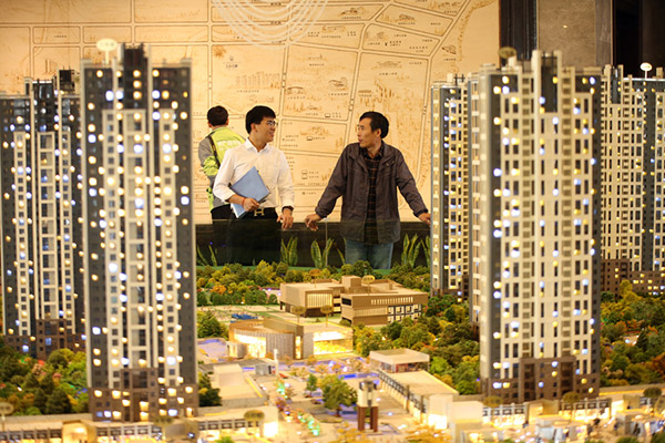 China tightens loan rules to cool Beijing's property market