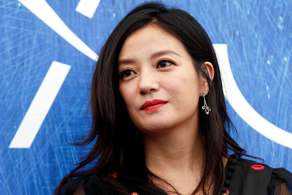 Zhao Wei, husband banned from capital markets for 5 years