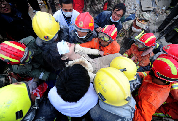 Woman pulled from rubble