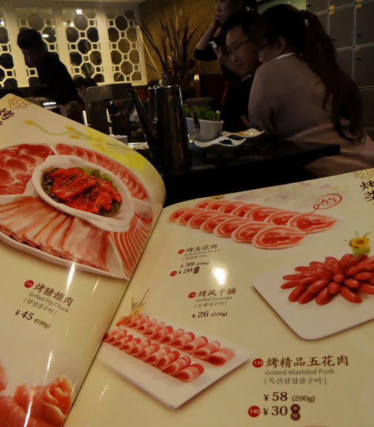 Beijing restaurants size down to save waste