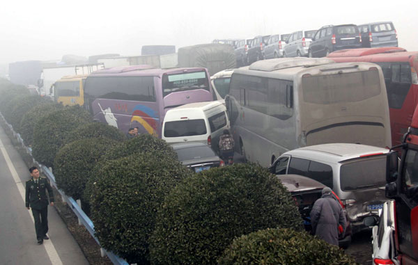 Vehicle pile-up kills 3, injures 13 in C China