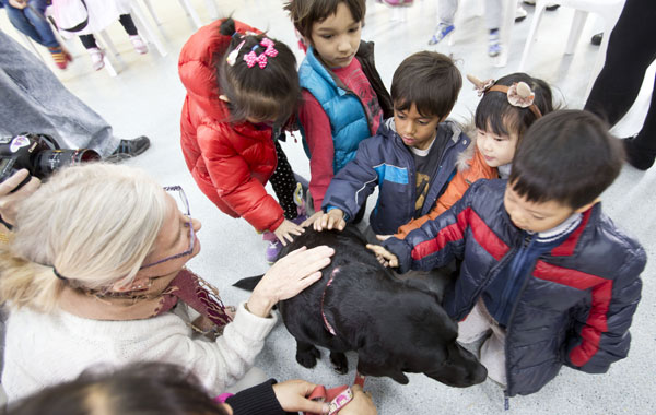 Working dogs get intimate with children