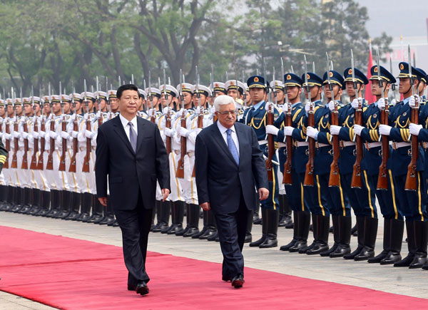 Xi meets Palestinian President in Beijing