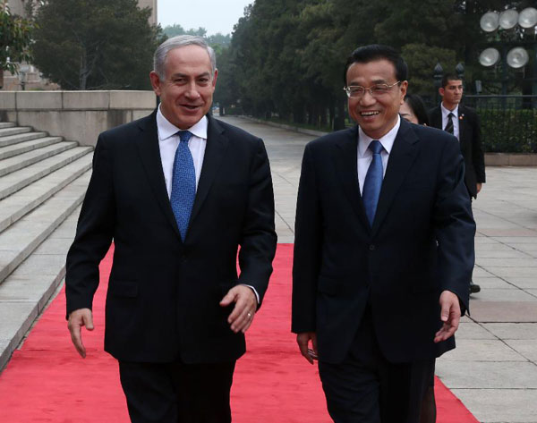 Li meets Israel PM, urging cooperation