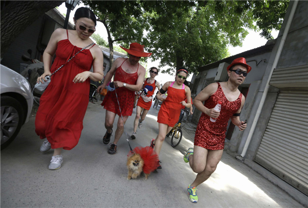 Red Dress Run charity event held on Mother's Day