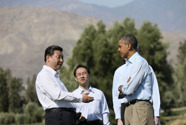 Obama and Xi start talk with a walk