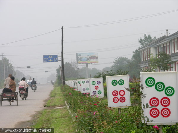 Mahjong tiles mark the way in N China