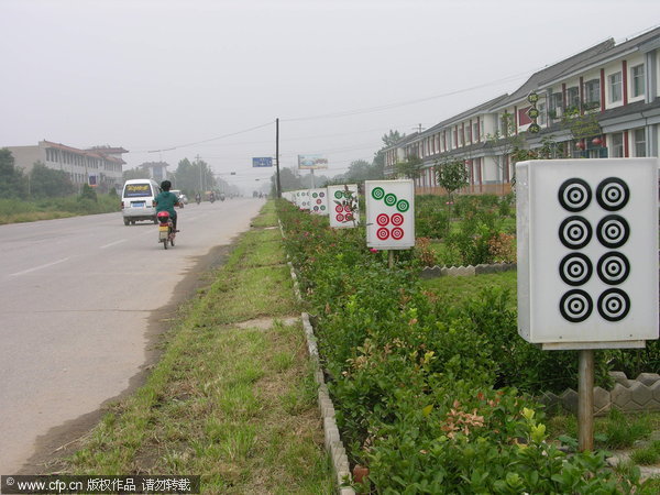 Mahjong tiles mark the way in N China