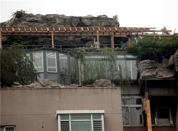 Roof-top oasis demolition begins