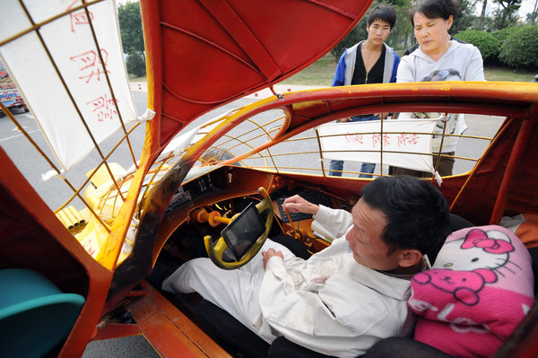 Sports car made from junk dazzles onlookers