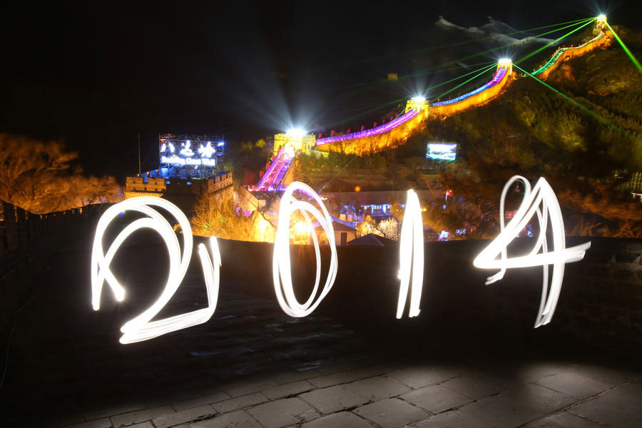 Revelers embrace the Year of 2014 at Great Wall