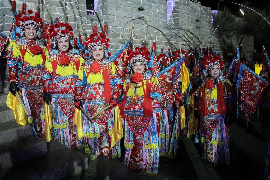 Revelers embrace the Year of 2014 at Great Wall