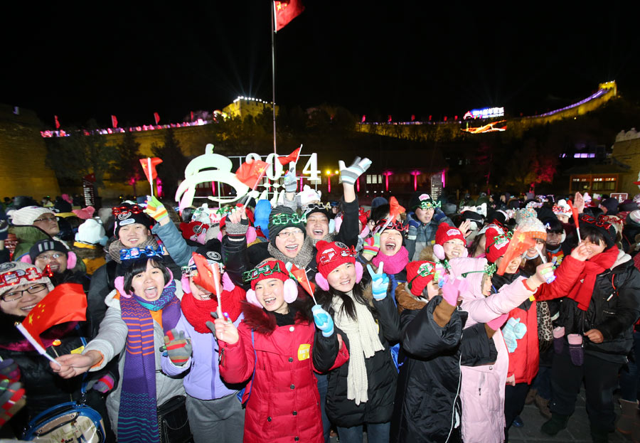 Revelers embrace the Year of 2014 at Great Wall