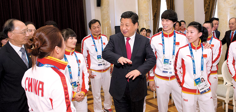 Display your spirit, Xi tells athletes