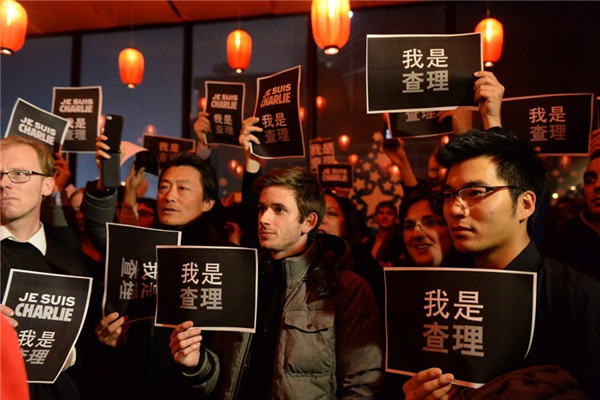 Foreign press mourns Paris victims in Beijing