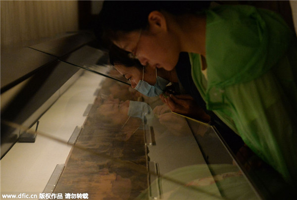 Renowned scroll painting unrolled at the Palace Museum