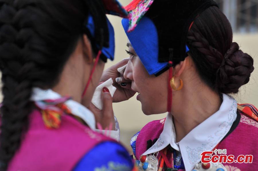 Young couple holds traditional Tibetan wedding ceremony