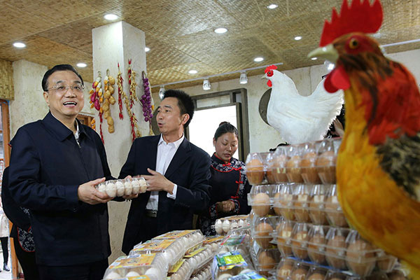 Premier Li stresses food quality in Lushan county