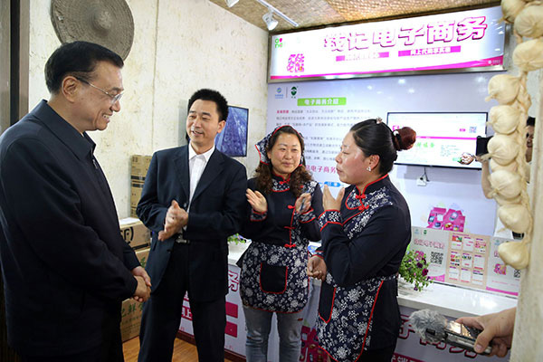 Premier Li stresses food quality in Lushan county