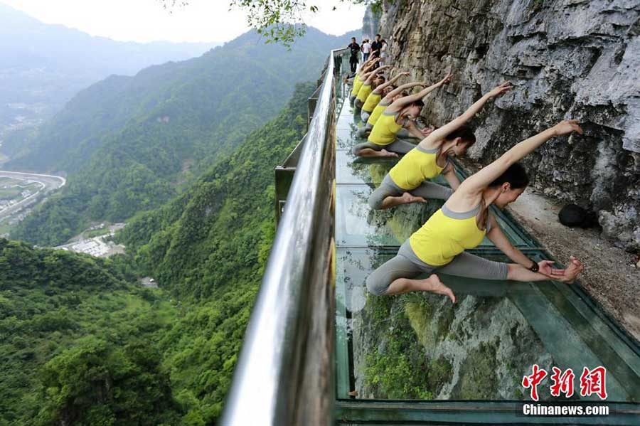 Yoga performance on cliff road in C China