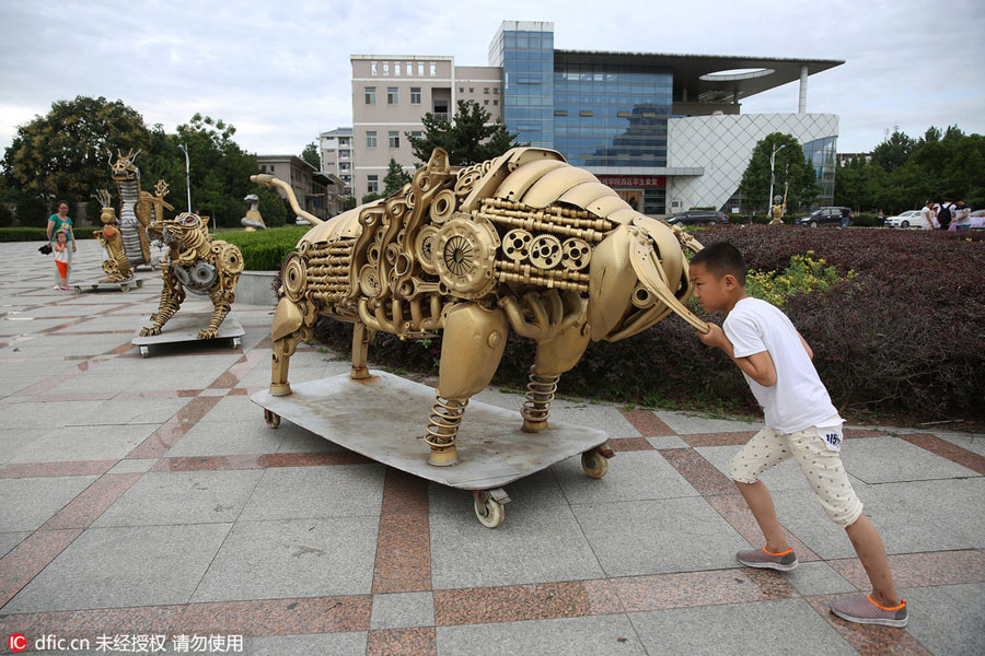 Students turn scrap parts into animal statues