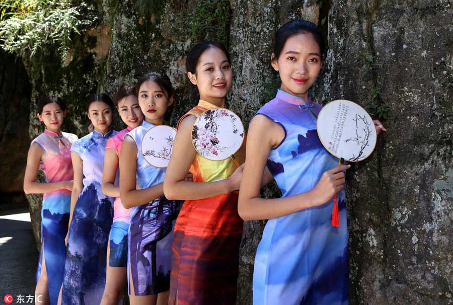 Models catwalk in <EM>qipao</EM> on famous mountain in Henan