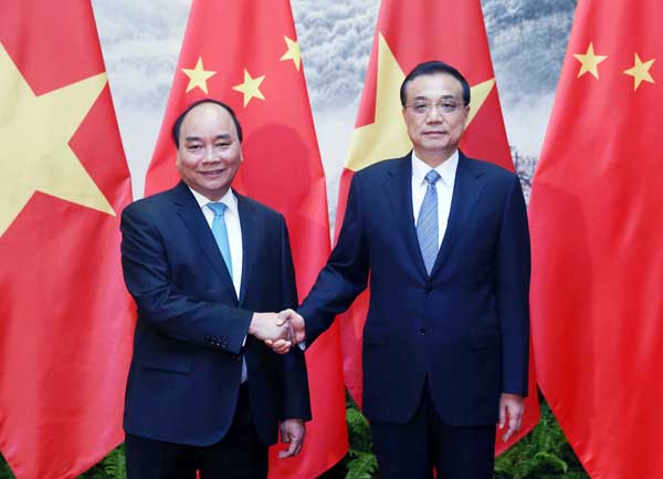 Premier Li welcomes Vietnam's Phuc