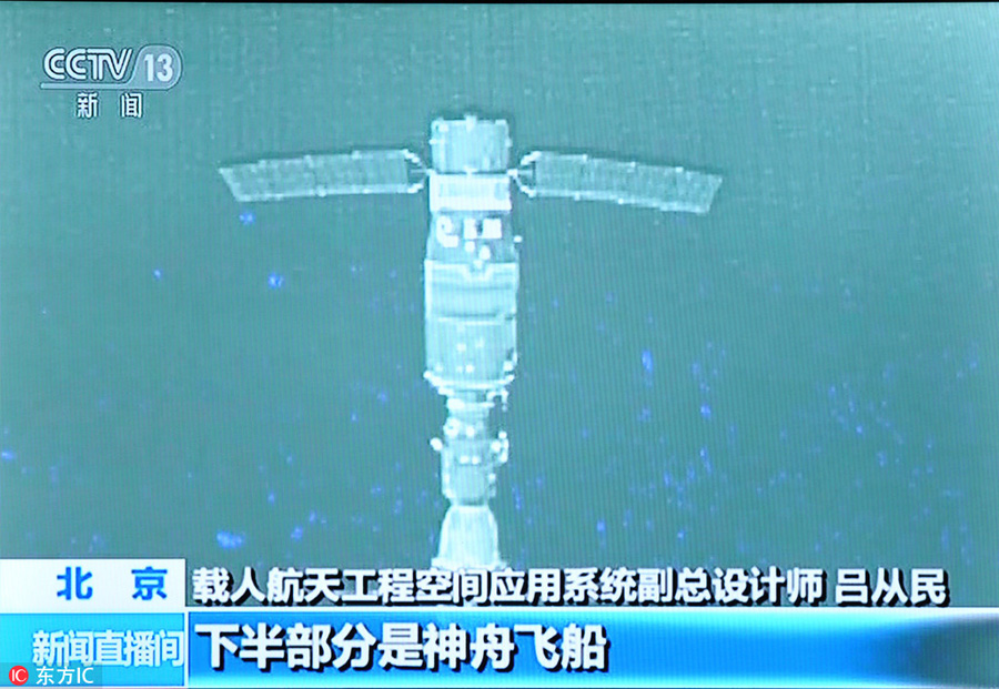 Accompanying satellite sends back images of Tiangong II, Shenzhou XI