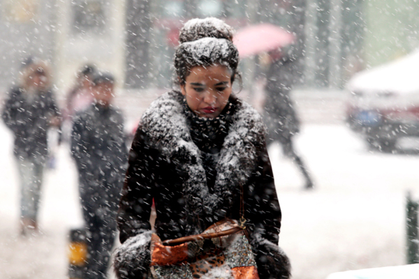 Cold wave brings snow, wind, rain to much of nation