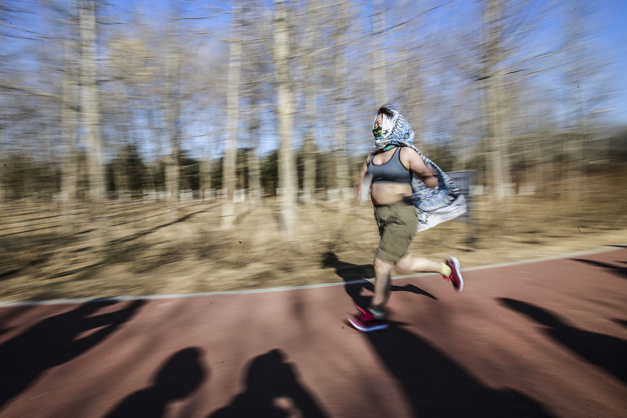 Reporter steals the show at Beijing Naked Run