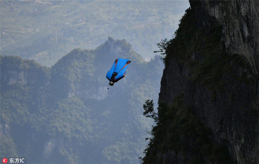 Wingsuit flying championship kicks off in Hunan