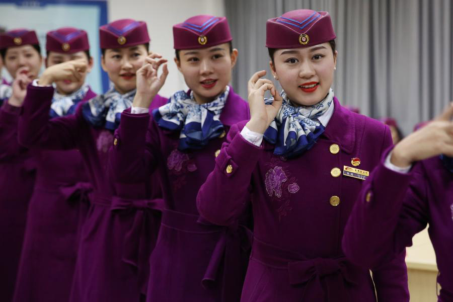 High-speed train stewardesses receive training in SW China