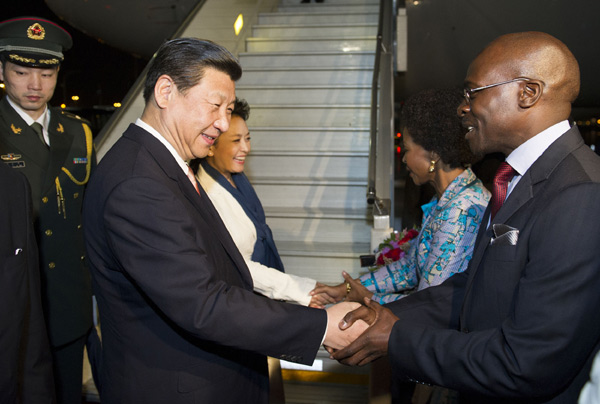 Xi in S. Africa for state visit, BRICS summit