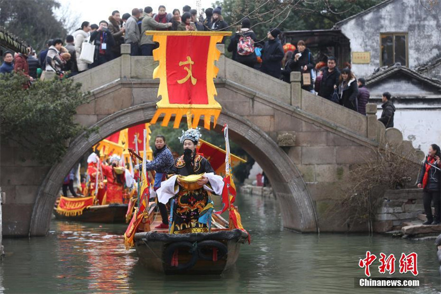 Water village welcomes 'God of Wealth' with ancient ceremony