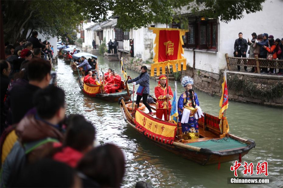 Water village welcomes 'God of Wealth' with ancient ceremony