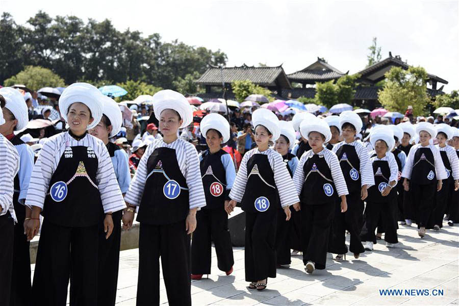 Bouyei ethnic group hold headscarves contest in SW China's Guizhou