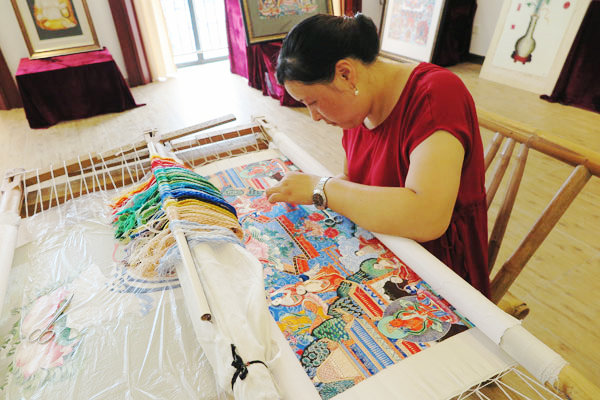 Suzhou embroidery featuring Buddha goes on show in Zhejiang