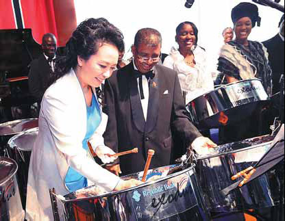 First lady turns on the charm, impresses hosts