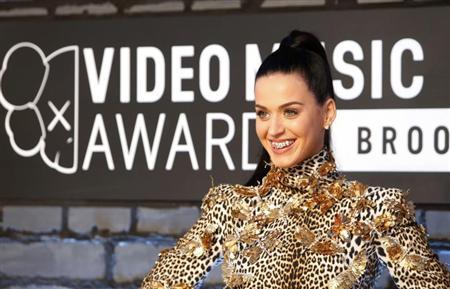 Katy Perry roars to top of British singles chart