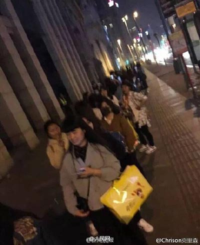 Fans line up in Shanghai to pose with postbox touched by pop star