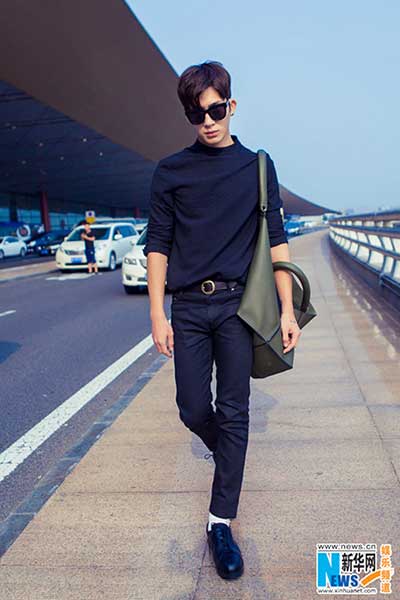 Actor Jing Boran poses in all-black