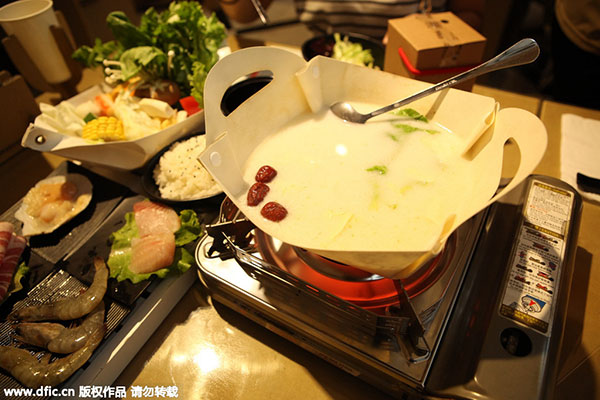 Eat from a paper hotpot
