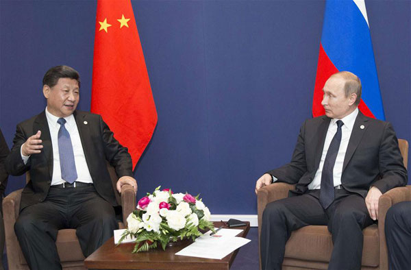 Xi, Putin agree to enhance anti-terrorism cooperation