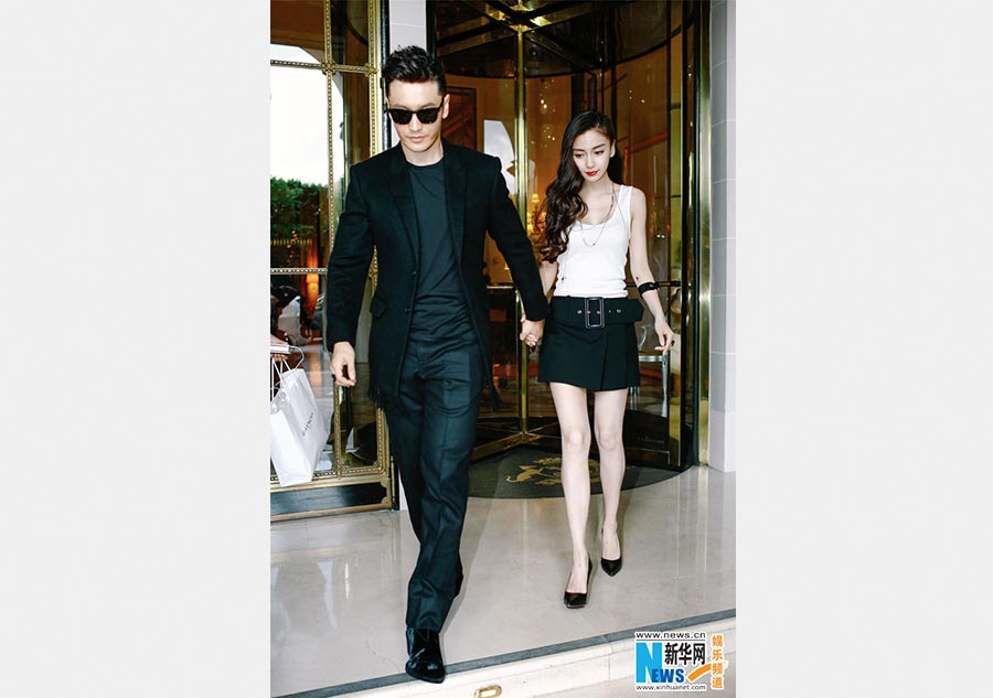 Huang Xiaoming and Angelababy spotted in Paris