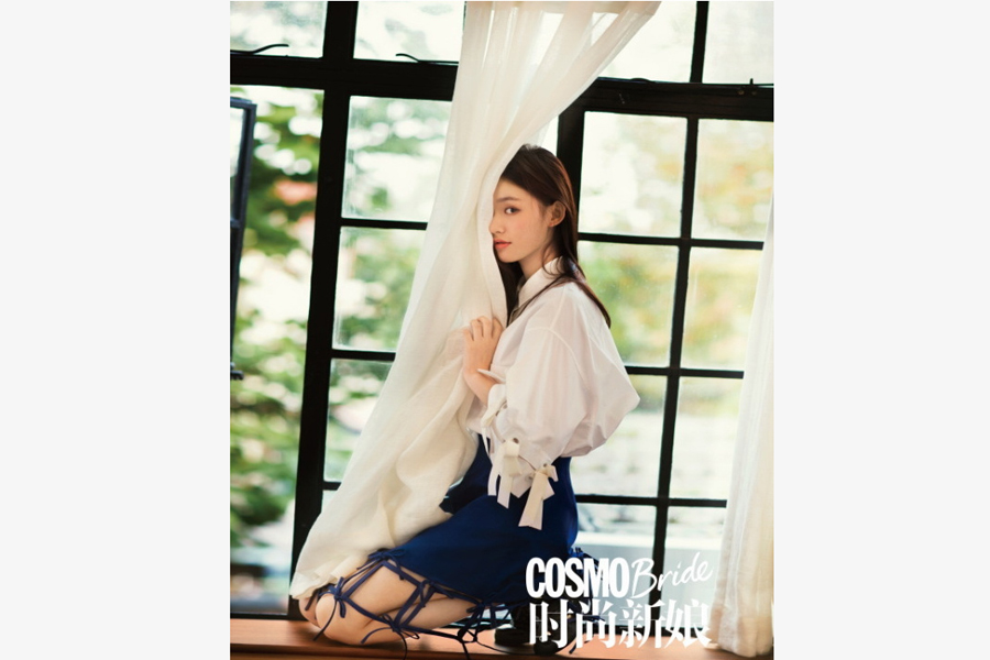 Actress Lin Yun poses for fashion magazine