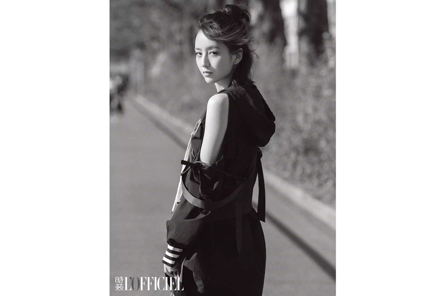 Actress Tong Liya poses for fashion magazine