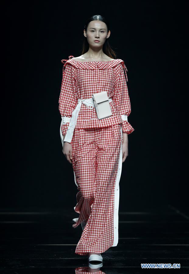 Joint fashion creations presented at China Fashion Week